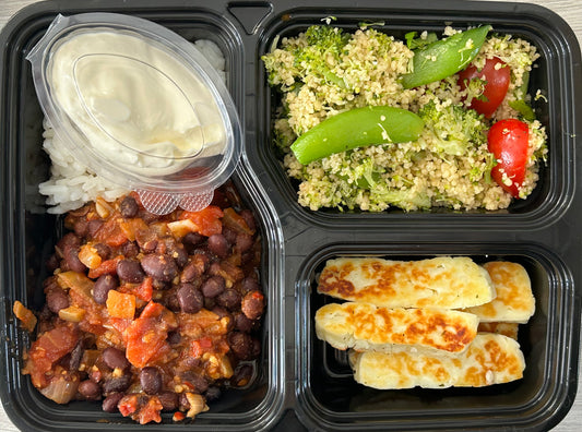 Meal - Black bean chilli with white rice, grilled halloumi, spiced couscous salad and creme fraiche