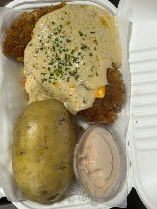 Meal - Cheddamelt chicken schnitzel, crispy onion rings, pink sauce and baked potato
